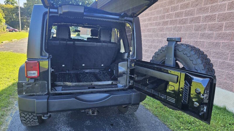 Jeep Wrangler Unlimited for sale at Arcia Services — photo 17