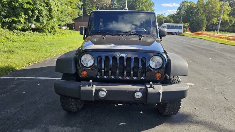 Jeep Wrangler Unlimited for sale at Arcia Services — photo 2