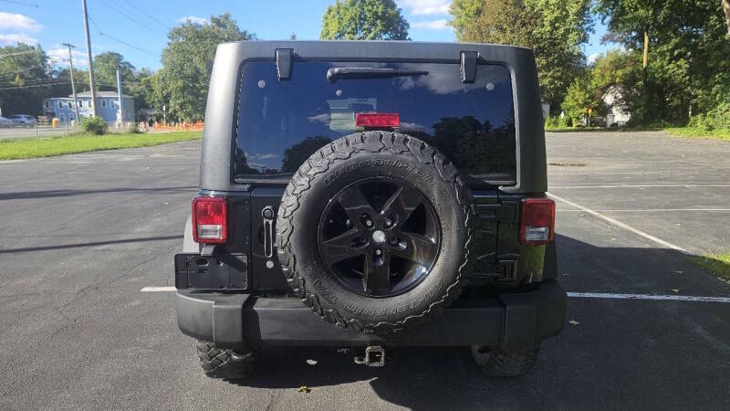 Jeep Wrangler Unlimited for sale at Arcia Services — photo 6