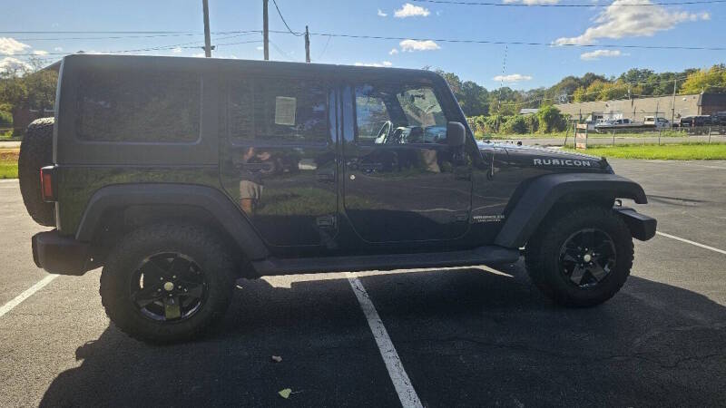 Jeep Wrangler Unlimited for sale at Arcia Services — photo 4
