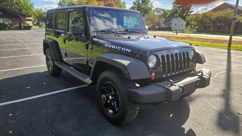 Jeep Wrangler Unlimited for sale at Arcia Services — photo 3