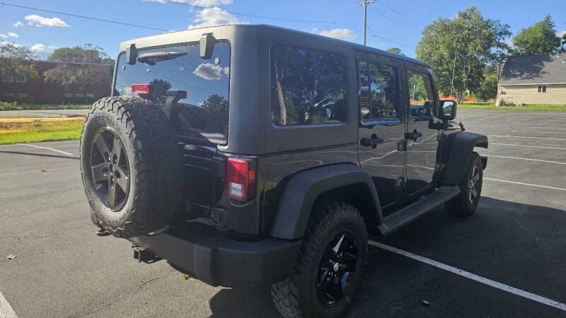 Jeep Wrangler Unlimited for sale at Arcia Services — photo 5
