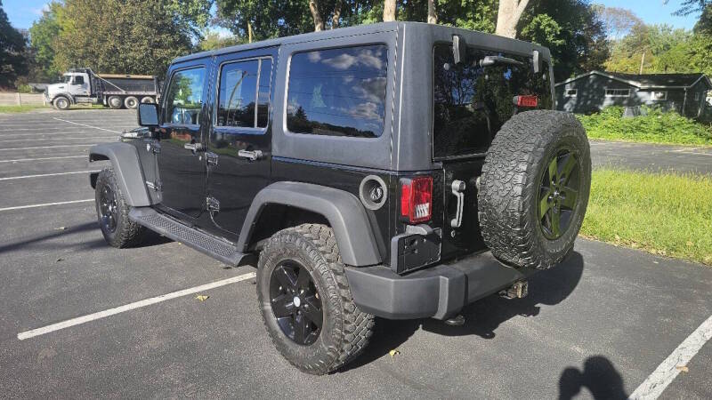 Jeep Wrangler Unlimited for sale at Arcia Services — photo 7