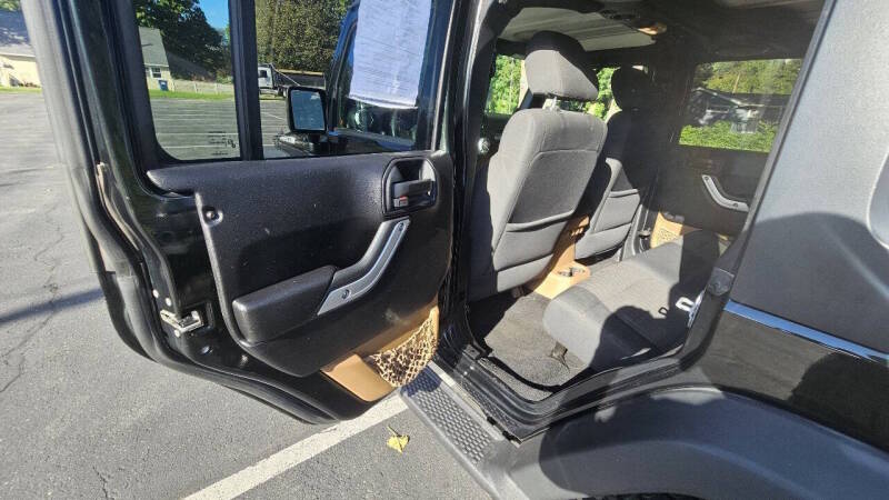 Jeep Wrangler Unlimited for sale at Arcia Services — photo 12