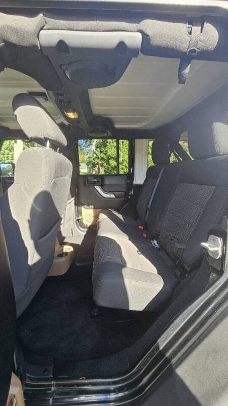 Jeep Wrangler Unlimited for sale at Arcia Services — photo 13
