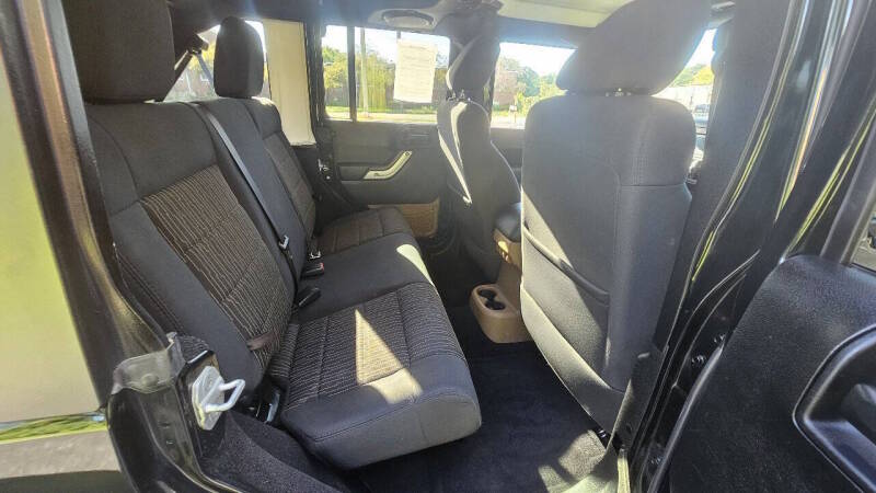 Jeep Wrangler Unlimited for sale at Arcia Services — photo 16