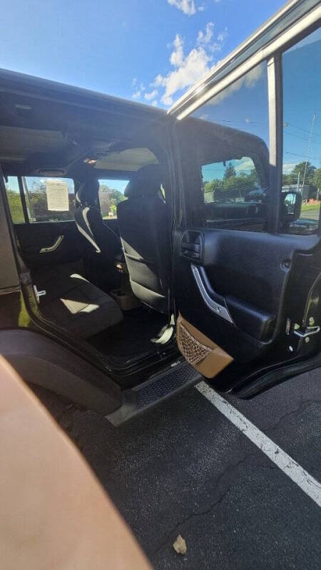 Jeep Wrangler Unlimited for sale at Arcia Services — photo 15
