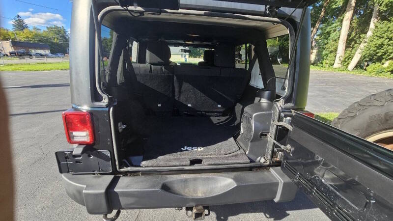 Jeep Wrangler Unlimited for sale at Arcia Services — photo 14