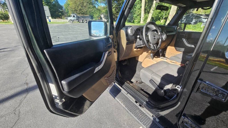 Jeep Wrangler Unlimited for sale at Arcia Services — photo 9