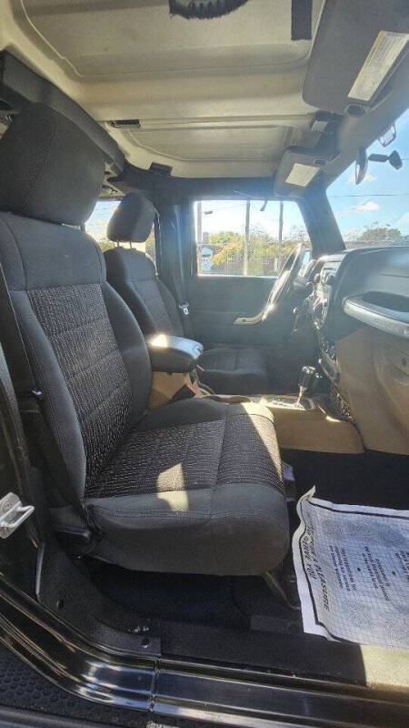 Jeep Wrangler Unlimited for sale at Arcia Services — photo 19