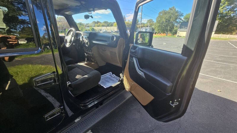 Jeep Wrangler Unlimited for sale at Arcia Services — photo 17