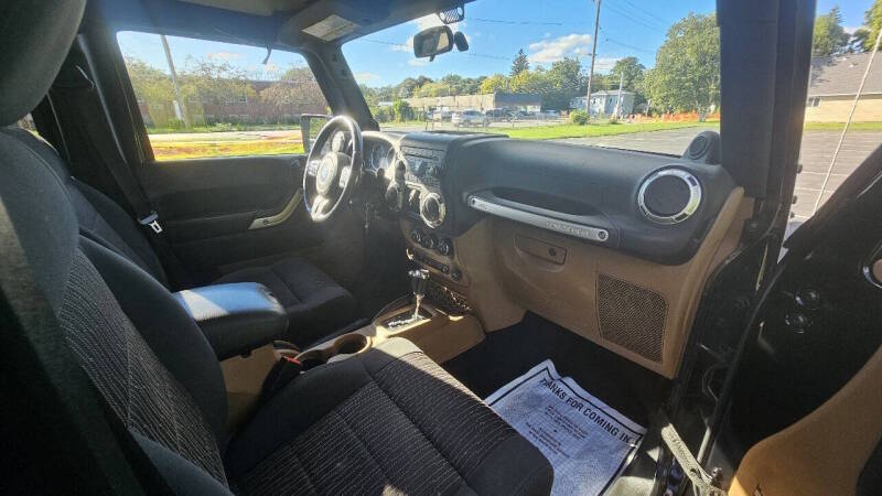 Jeep Wrangler Unlimited for sale at Arcia Services — photo 18