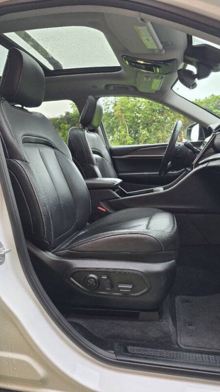Jeep Grand Cherokee L for sale at Arcia Services — photo 22
